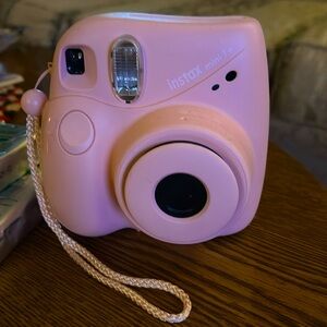 Pink instamax mini 7 with 3 packs of film never opened